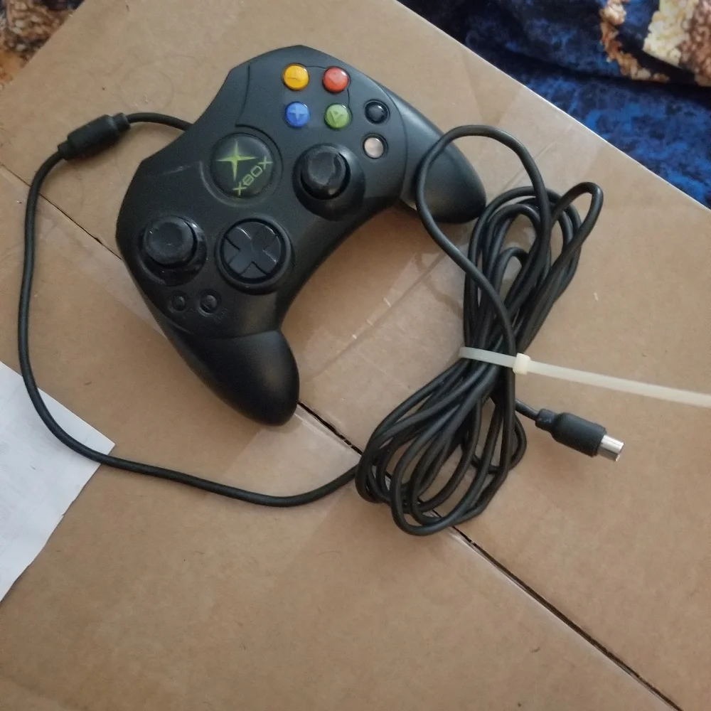 2 Controllers Wireless Xbox 360 & a wired Original X Box with Colored Buttons.